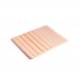CAPLAN. Multifunctional towel made of light and resistant cotton (90%) and recycled cotton (10%), orange